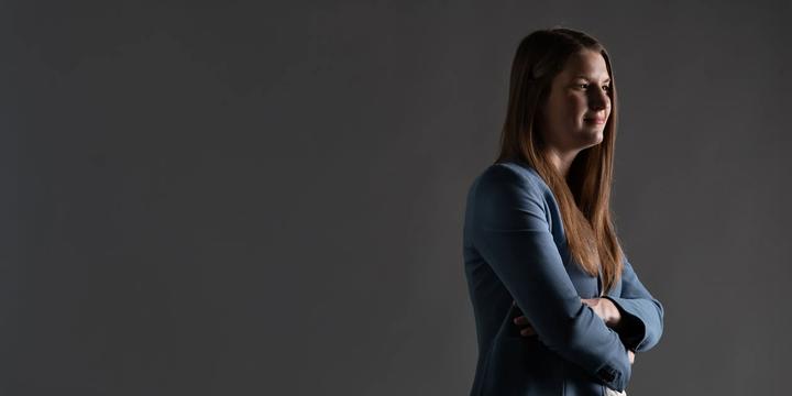 Profile shot of Accountancy Professor Jessica Watkins with dramatic lighting.