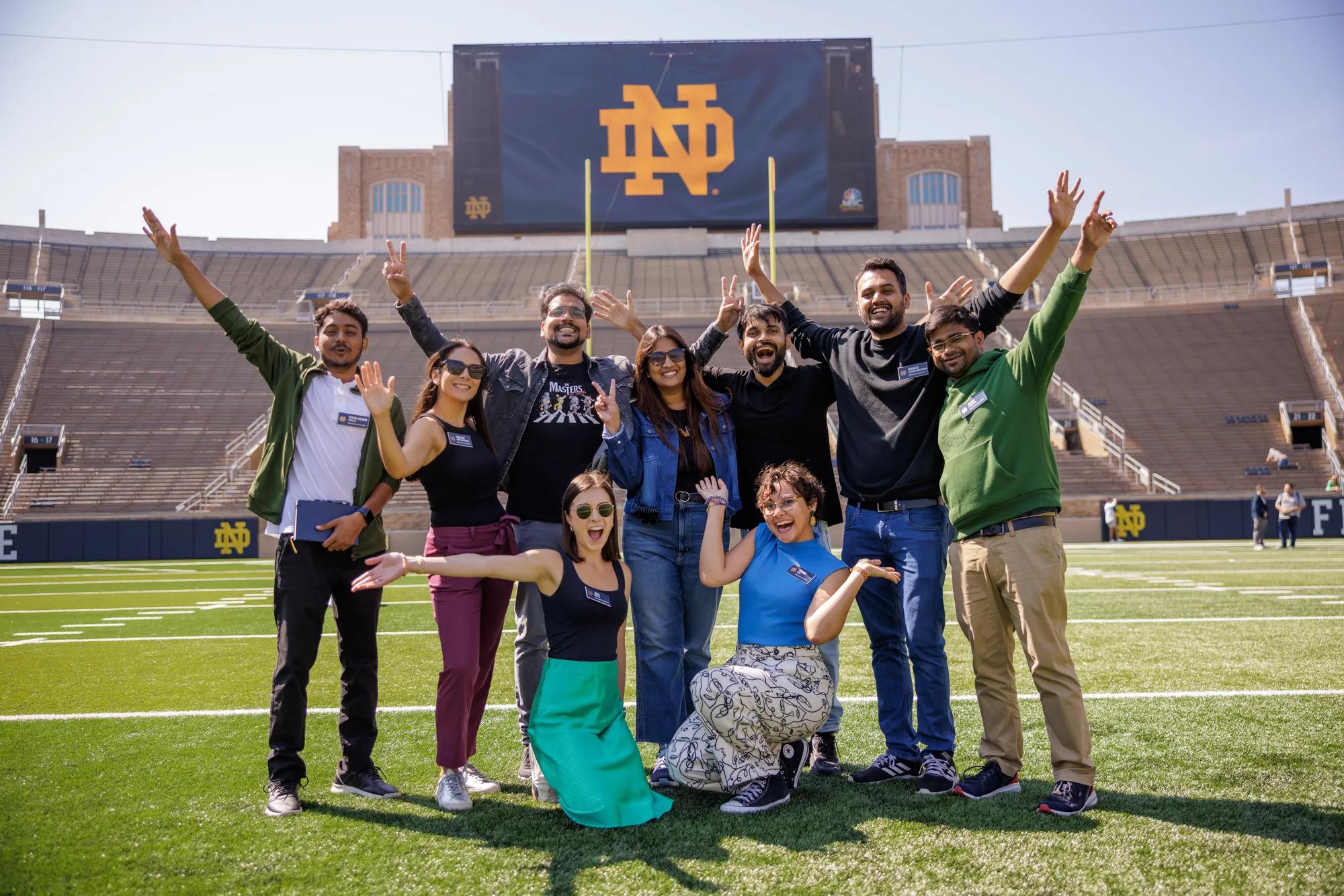 MBA 2-Year Class of 2025 in the stadium during orientation.